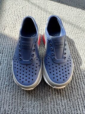 Native Slip-On Sneakers in Navy, White and Red Heel Accent